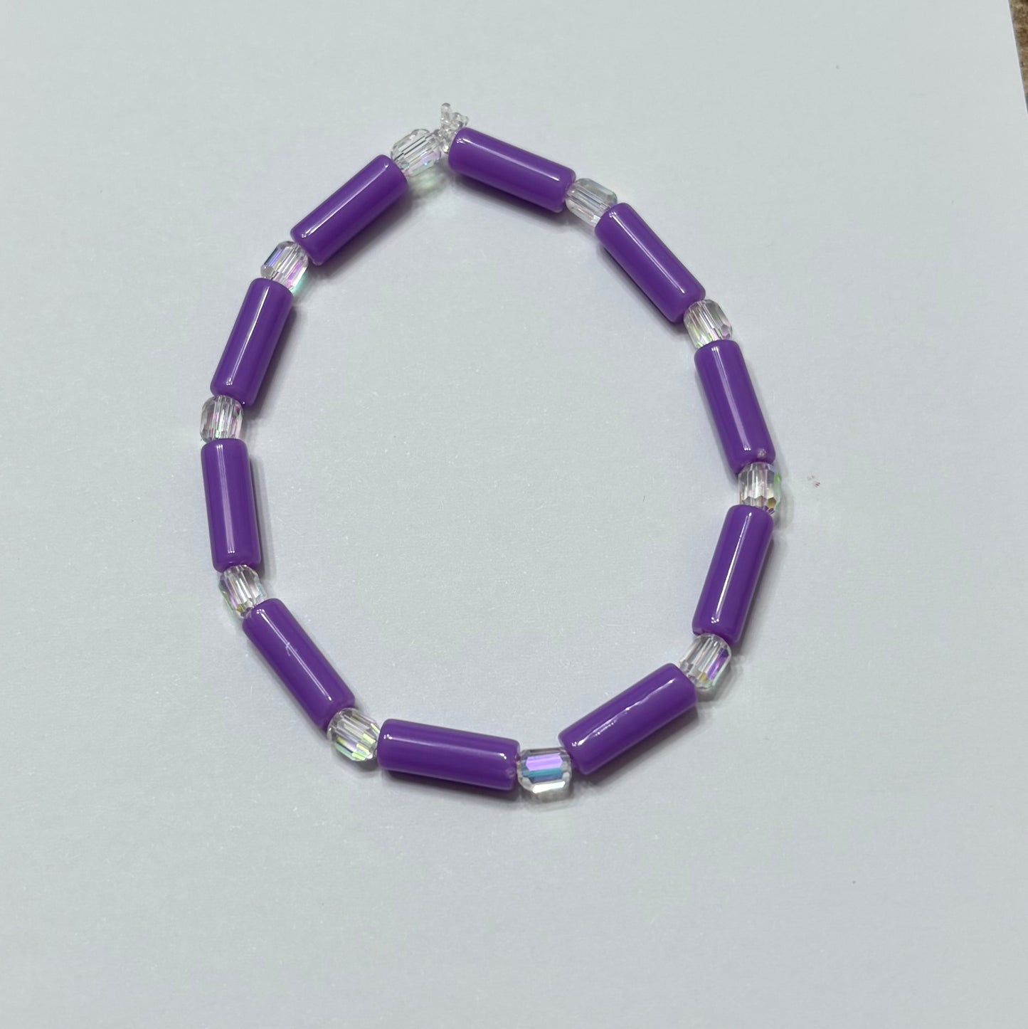 Purple beads with white shining spacers