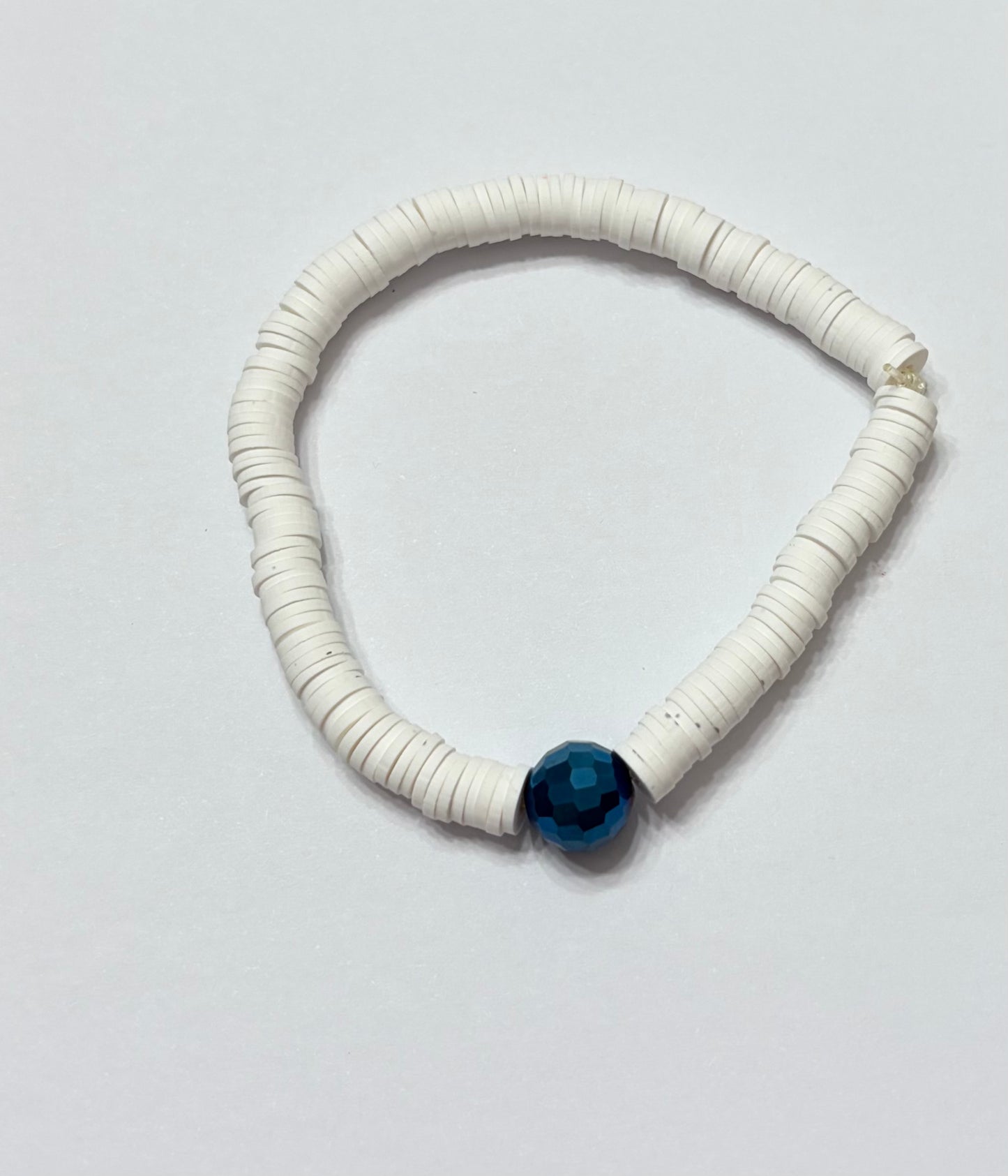 Play clay beads with disco ball bead in the middle