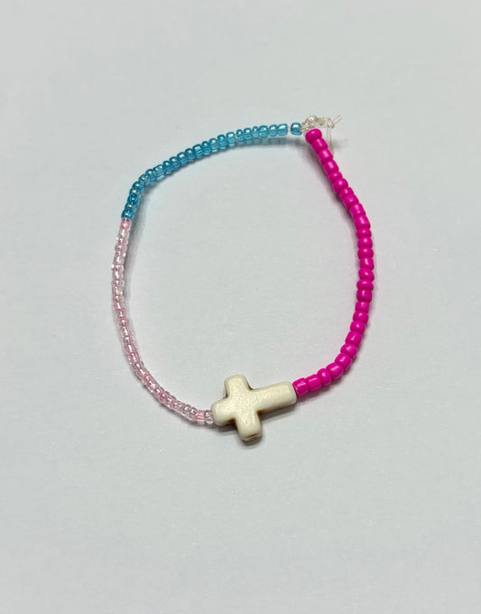 Pearl blue, pearl, pink, and hot pink with a cross in the middle
